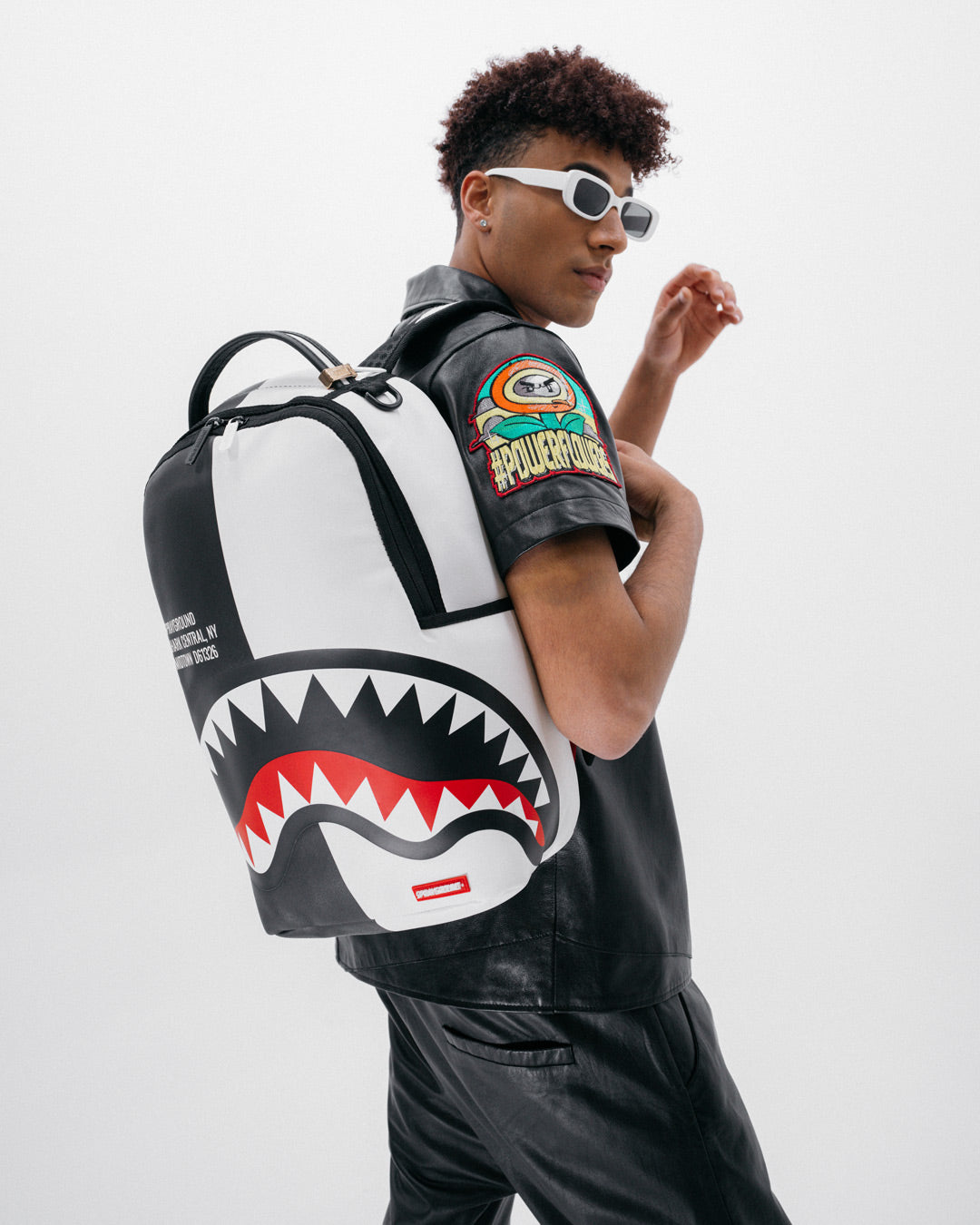 Black sprayground backpack online