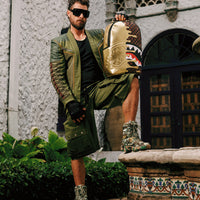 SPRAYGROUNDÂ® BACKPACK SHARKS IN PARIS GOLD DRIP BACKPACK