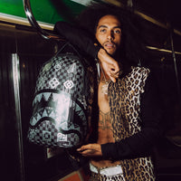 SPRAYGROUND® BACKPACK A.I.8 AFRICAN INTELLIGENCE SHARKGLYPHS BACKPACK