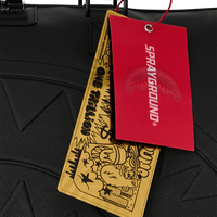 SPRAYGROUND® DUFFLE THE GOLDEN FANG SHARK DUFFLE